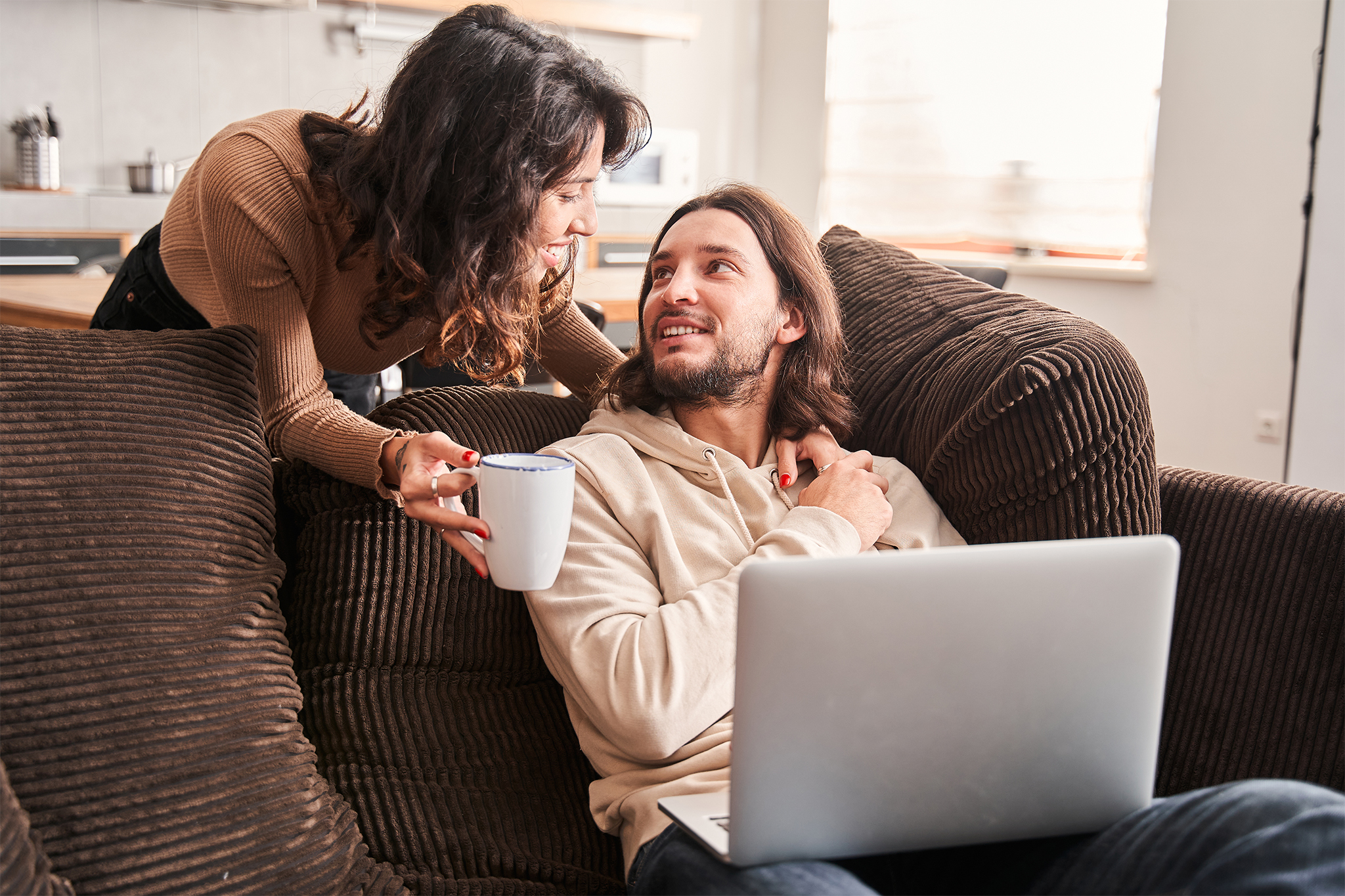 Couple comparing term and whole life insurance